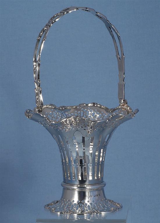 A George V silver swing handled trumpet shaped basket, Height 235mm weight 6.6oz/207grms